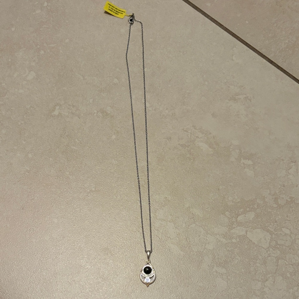 Elegant Silver Necklace with Black Pendant